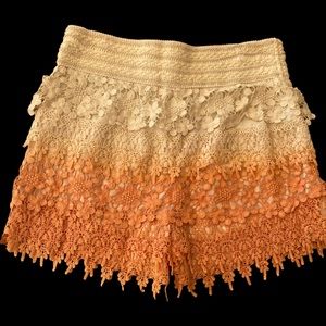 Large Love Culture coral shorts